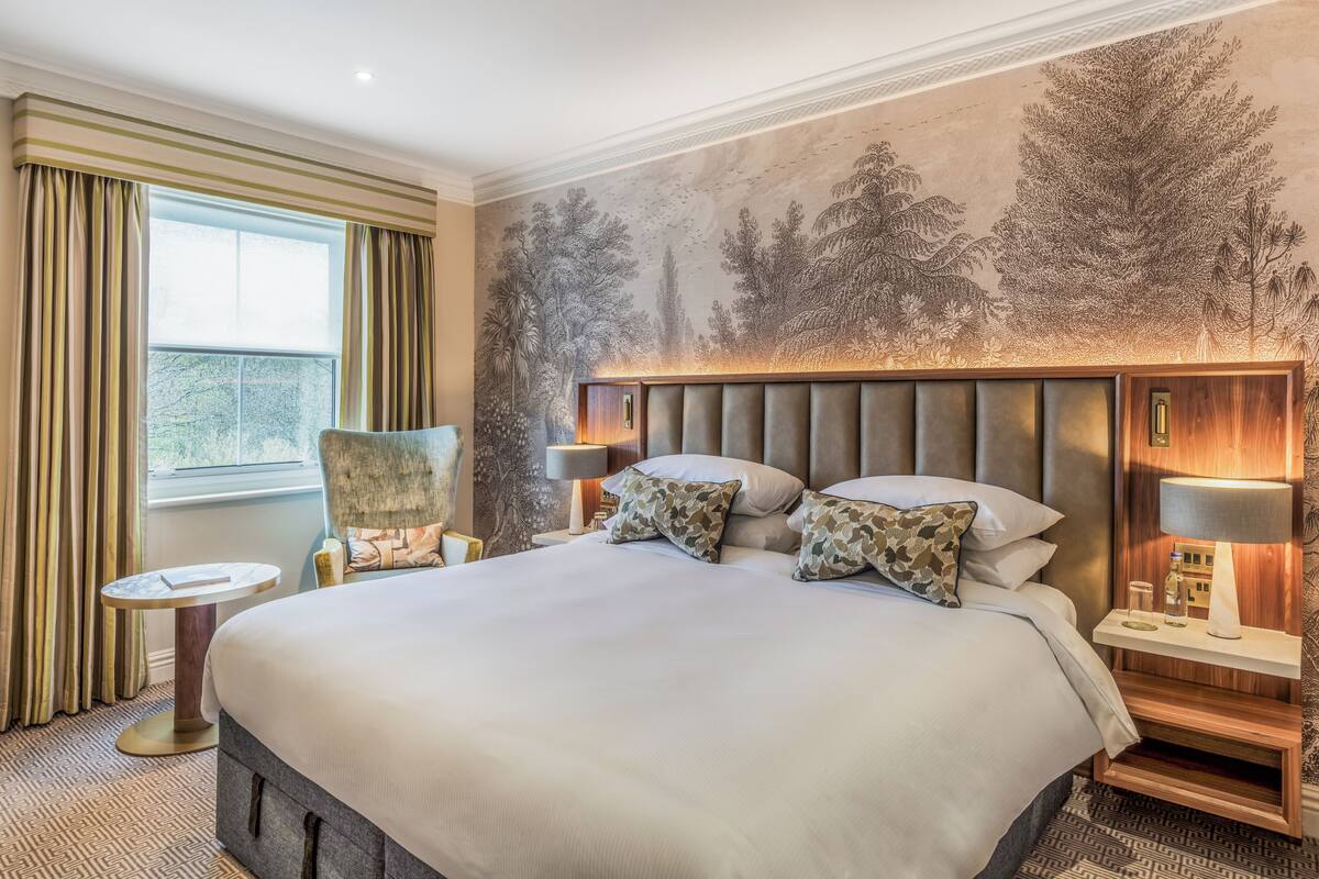 plush room | 1 bedroom, in-room safe, desk, iron/ironing board