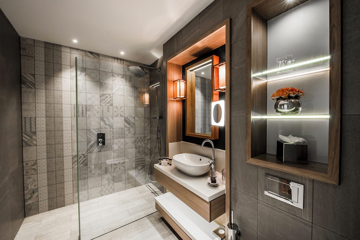 mews studio with access to the club at cottonmill spa | bathroom | shower, hair dryer, bathrobes, towels