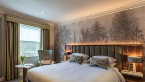 Plush Room | 1 bedroom, in-room safe, desk, iron/ironing board