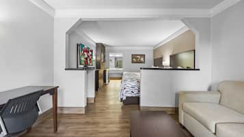 Suite, 2 Queen Beds, Non Smoking | Iron/ironing board, cribs (free), WiFi (free), alarm clocks