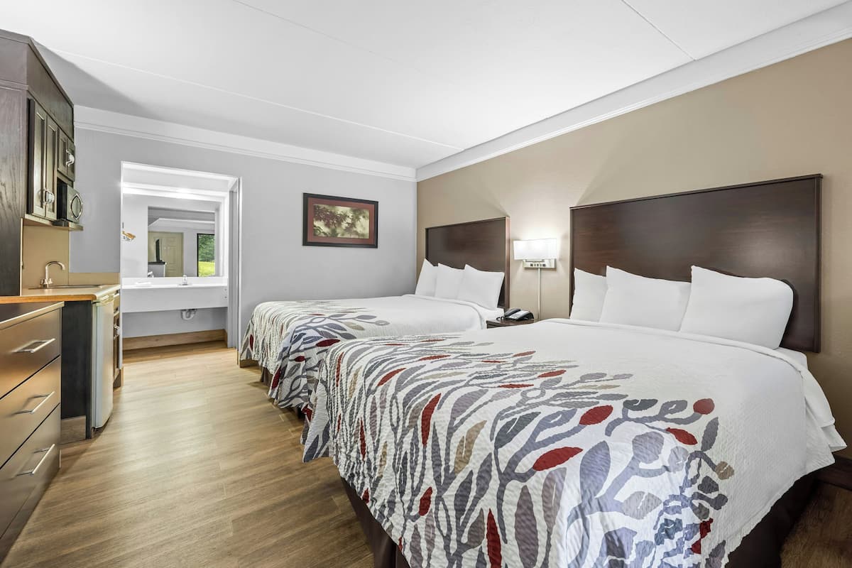 Suite, 2 camas Queen size, para no fumadores | Tabla de planchar con plancha, cunas gratuitas y wifi gratis