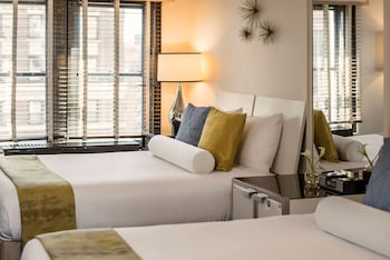 Egyptian cotton sheets, premium bedding, minibar, in-room safe at 70 Park Avenue