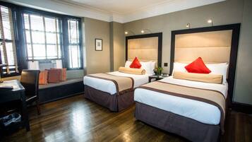 Premium bedding, down comforters, pillowtop beds, in-room safe