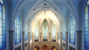 A church interior with high arched ceilings, stained glass windows, and a central altar. - Hotel Nikko Fukuoka (Fukuoka)