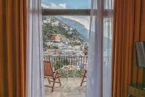Suíte com design assinado, terraço, vista para o mar | Terraço/pátio
