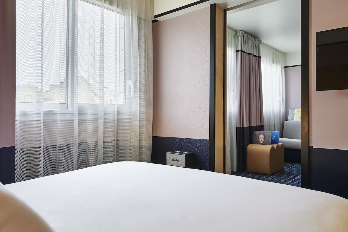 Suite, 1 lit double et 1 canapé-lit | 1 chambre, literie de qualité, minibar, coffre-fort