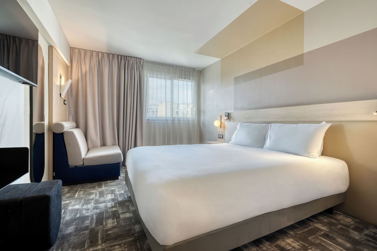 Superior kamer, 1 tweepersoonsbed met slaapbank | 1 slaapkamer, luxe beddengoed, een minibar, een kluis op de kamer