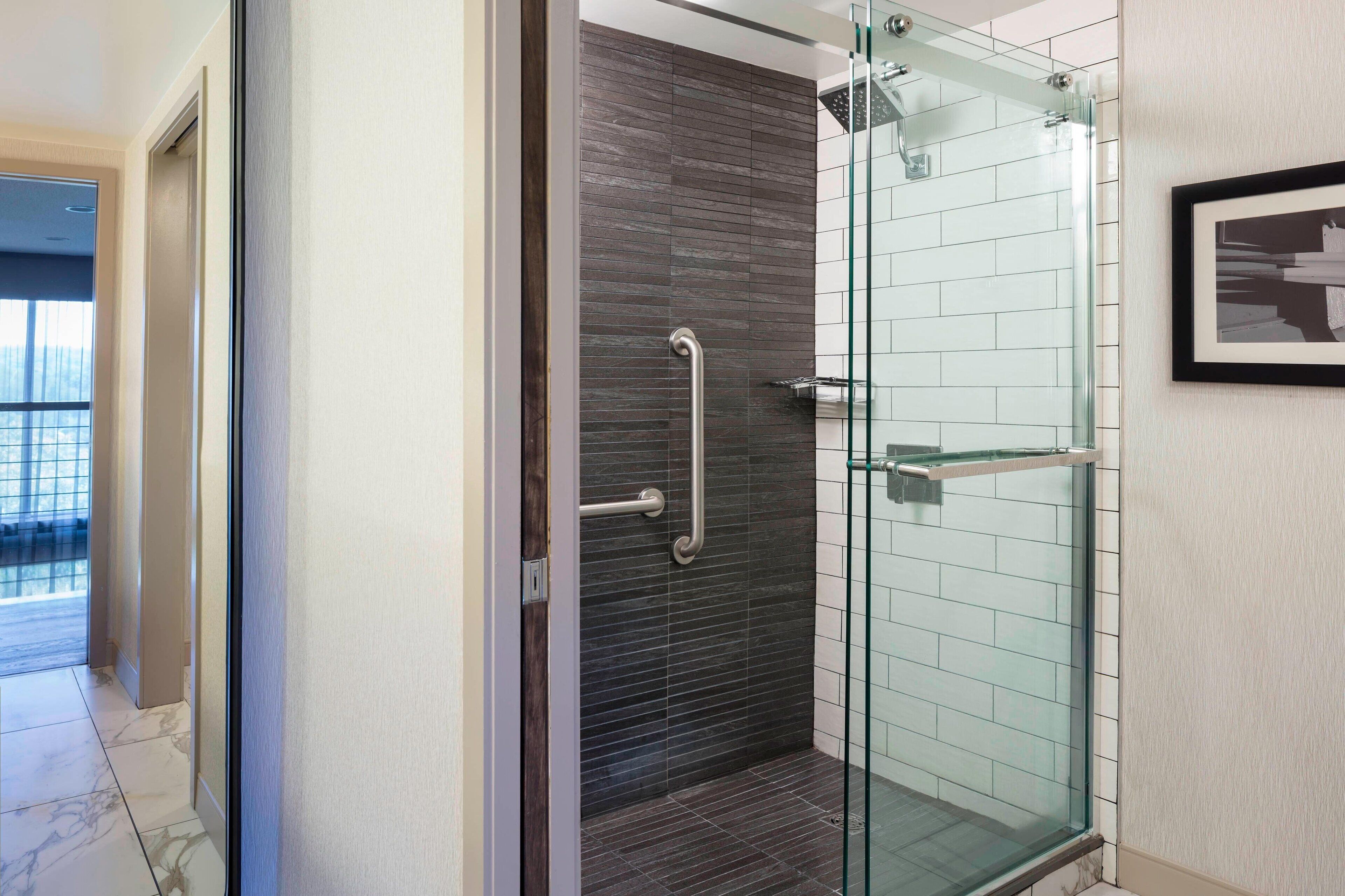 combined shower/bathtub, free toiletries, hair dryer, bathrobes