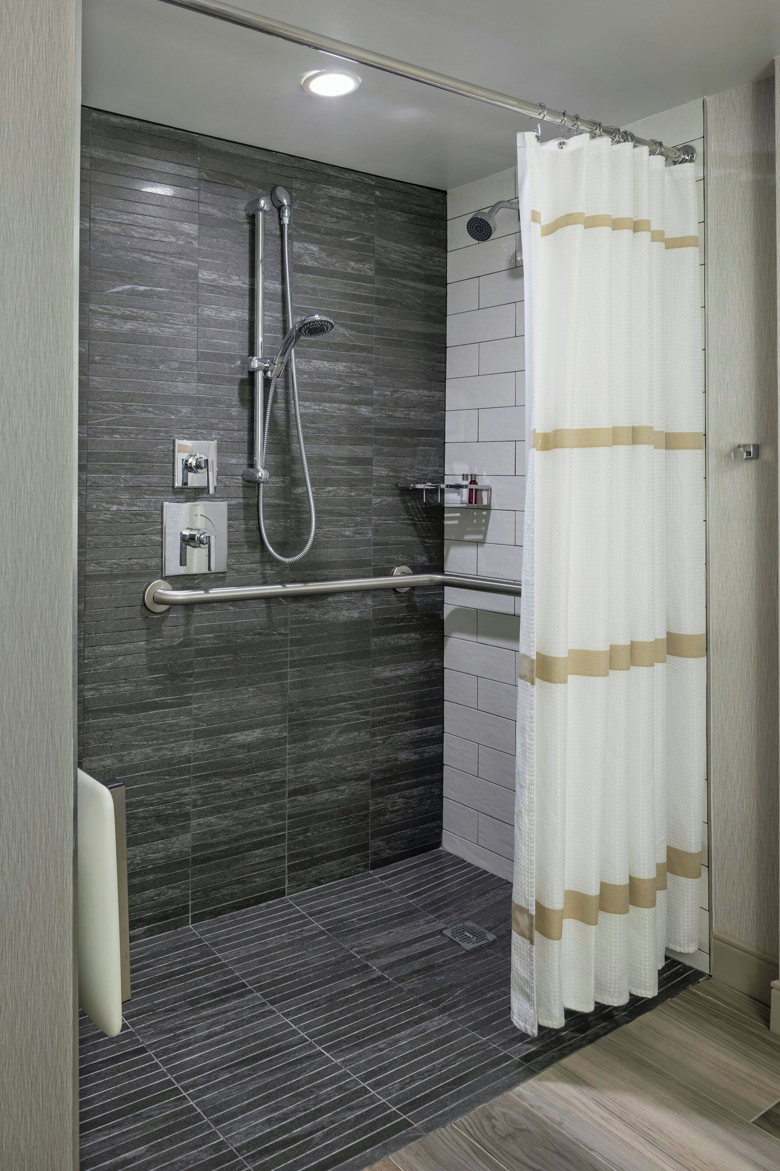 combined shower/bathtub, free toiletries, hair dryer, bathrobes