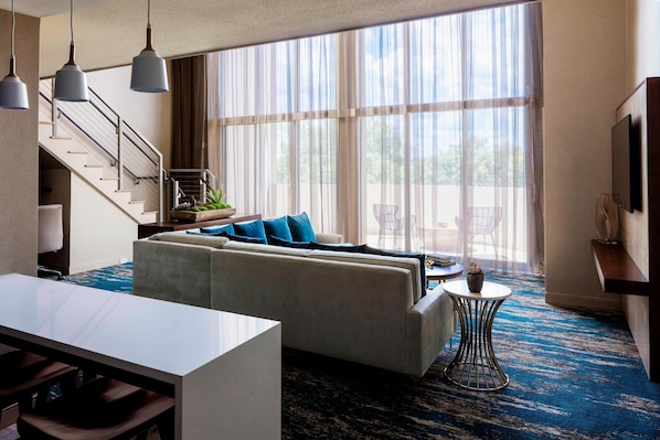 Een 55-inch smart-tv met kabelzenders, televisie en betaalfilms