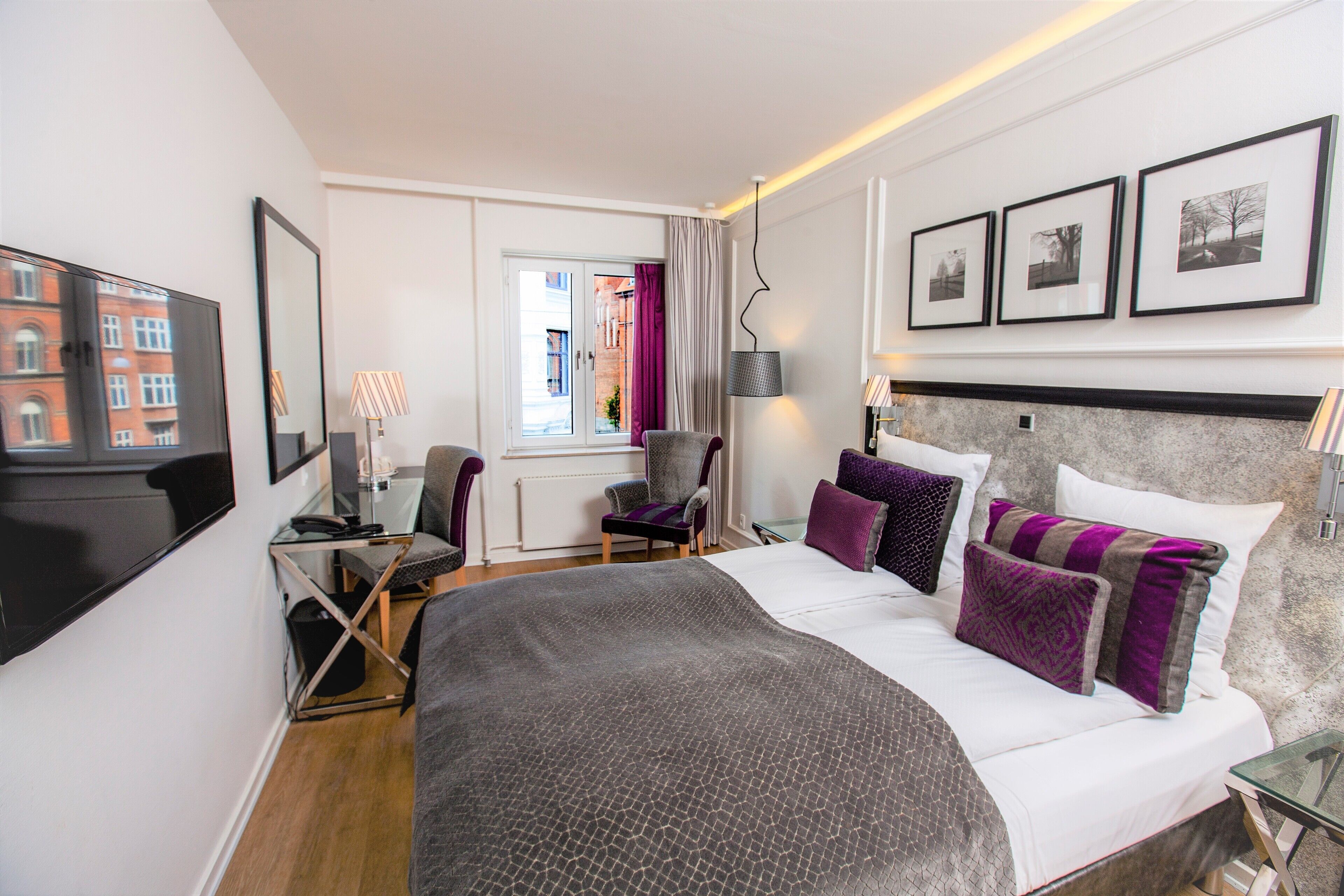 Hypo-allergenic bedding, down duvets, desk, blackout curtains
