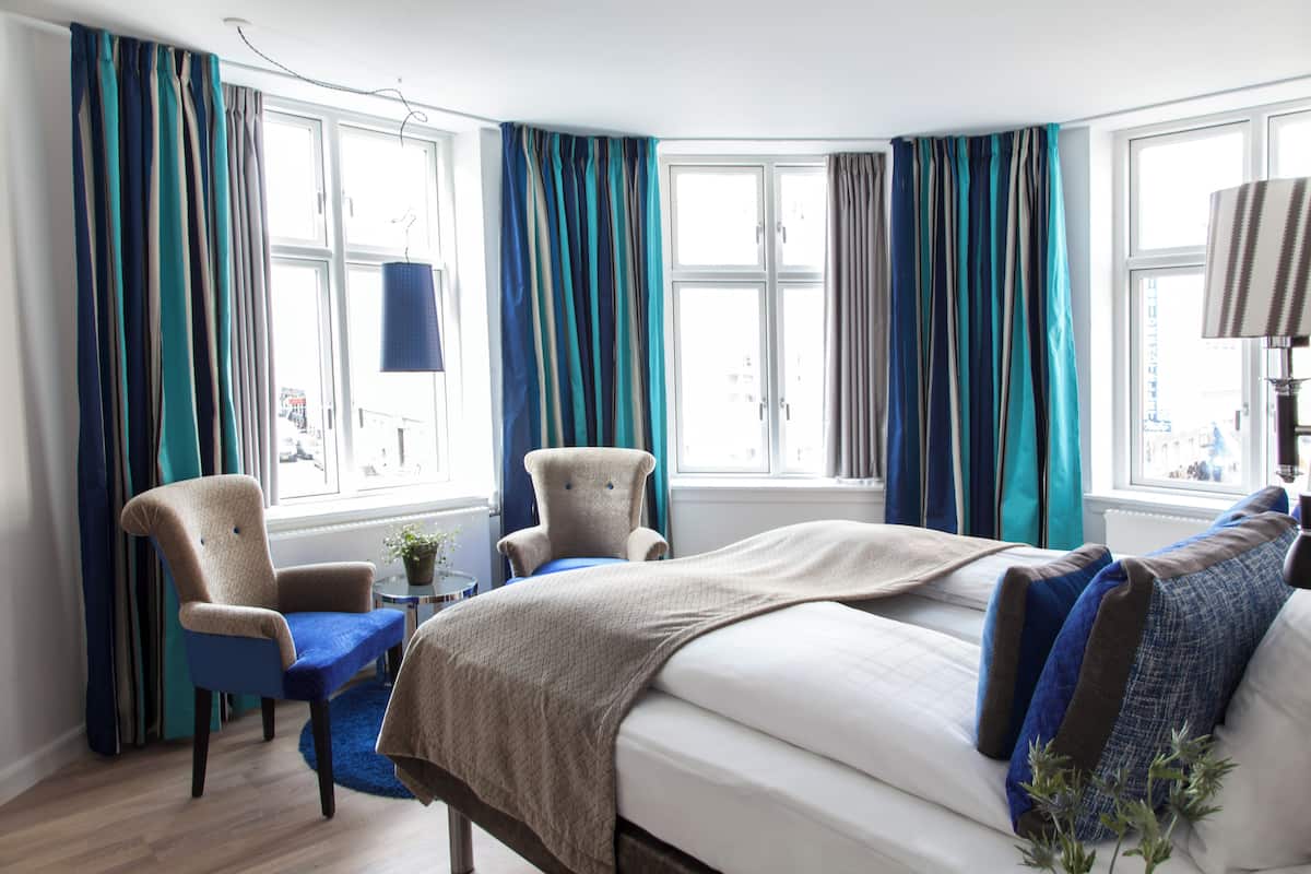 Hypo-allergenic bedding available, down comforters, desk