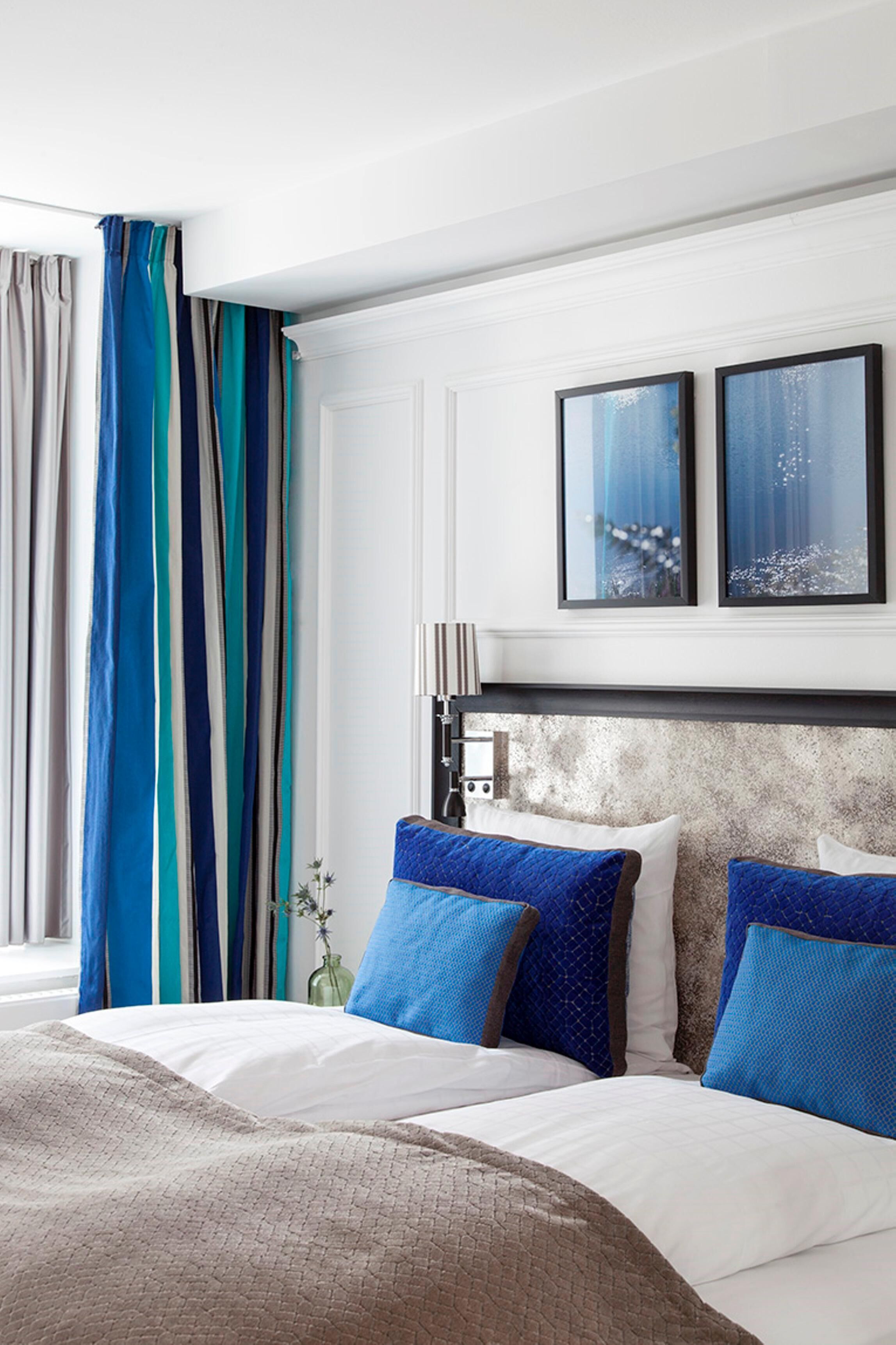 Hypo-allergenic bedding, down duvets, desk, blackout curtains