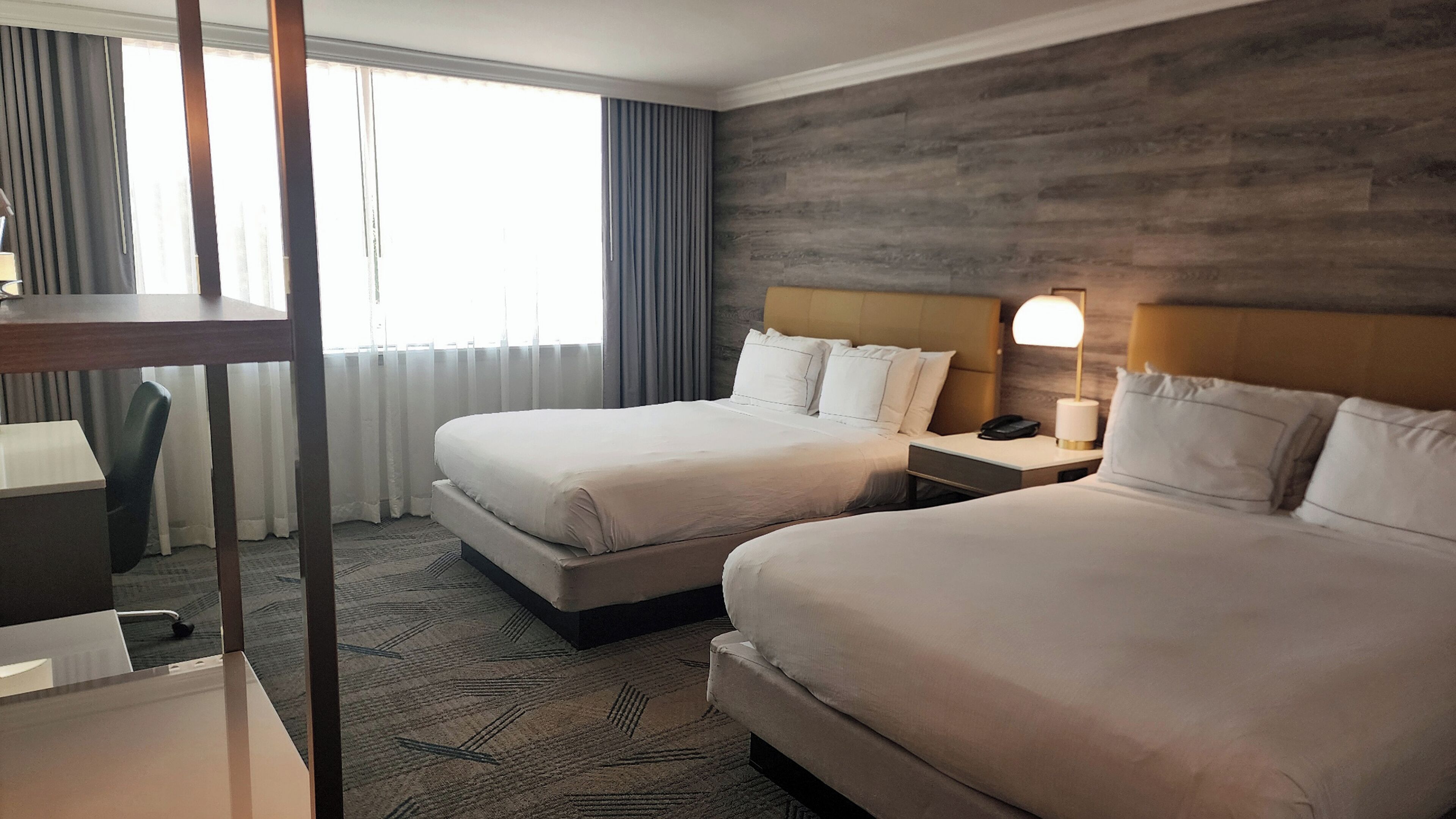 Premium bedding, down comforters, pillowtop beds, in-room safe