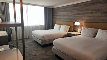 Premium bedding, down comforters, pillowtop beds, in-room safe