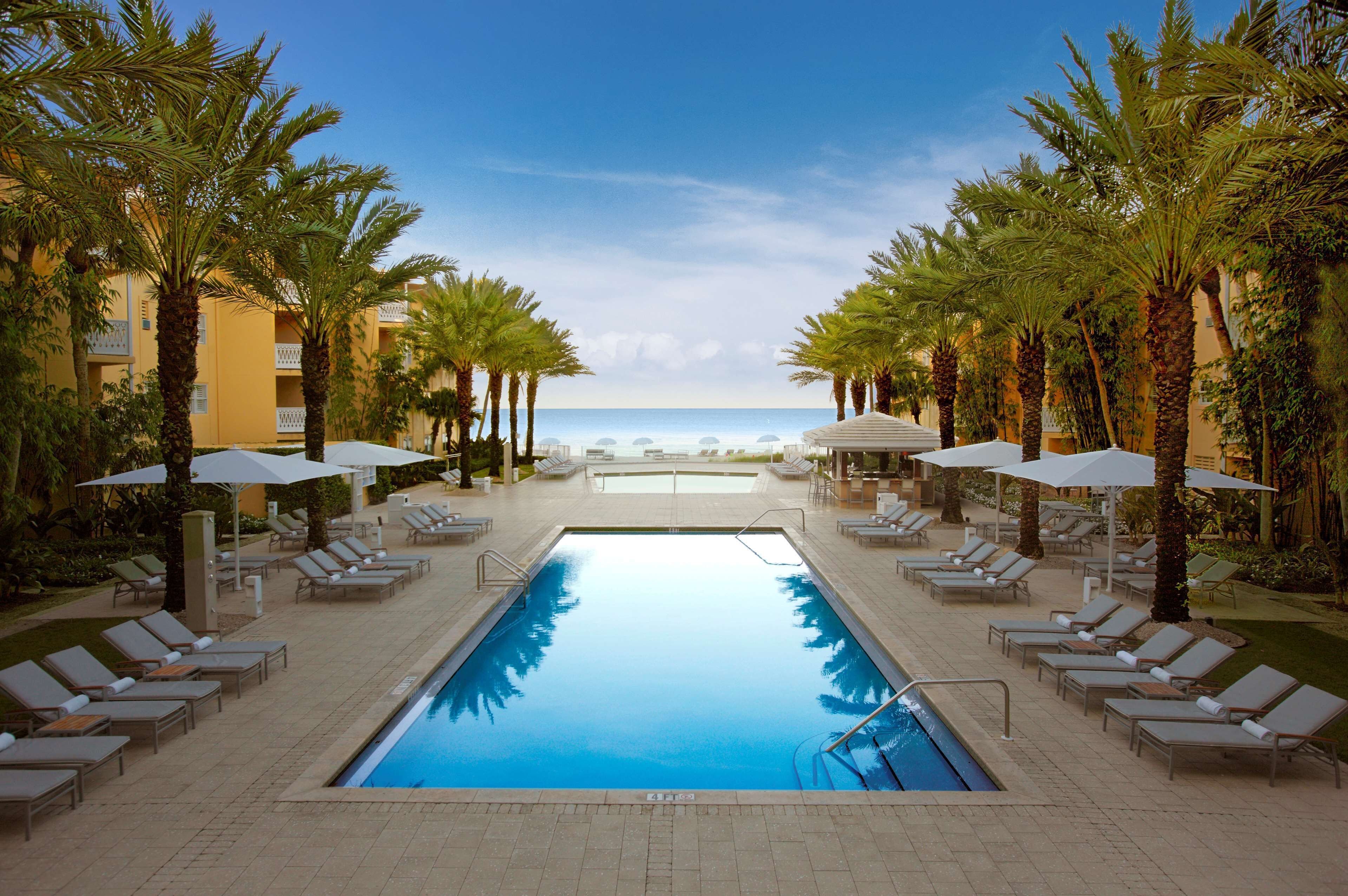 2 outdoor pools, pool umbrellas, sun loungers