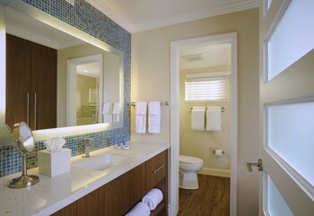Designer toiletries, hair dryer, bathrobes, slippers at Edgewater Beach Hotel