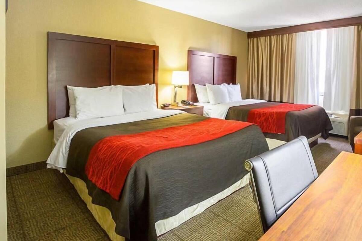 Desk, blackout drapes, iron/ironing board, free cribs/infant beds