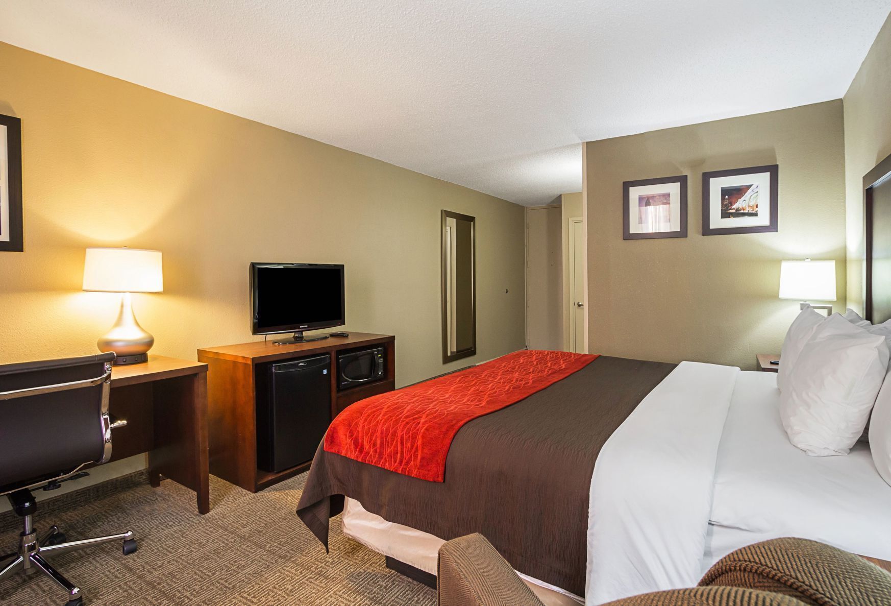 Desk, blackout drapes, iron/ironing board, free cribs/infant beds