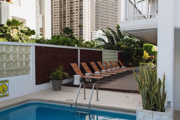 Outdoor pool, open 10:00 AM to 7:00 PM, sun loungers