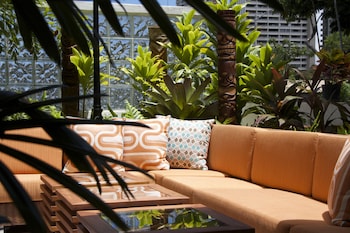 Sitting area in hotel lobby at Oasis Hotel Waikiki
