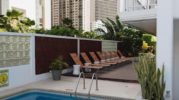 Outdoor pool, open 10:00 AM to 7:00 PM, sun loungers
