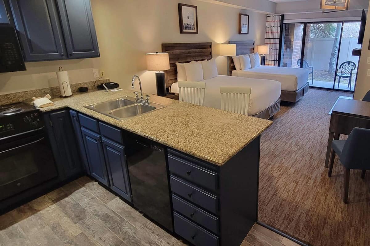 Suite, 2 Queen Beds, Non Smoking (Upgrade) | Pillowtop beds, blackout drapes, iron/ironing board, free WiFi