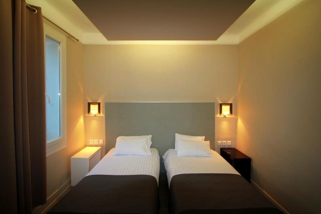twin room courtyard  | 2 bedrooms, in-room safe, desk, laptop workspace