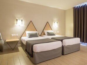 Twin Room Courtyard  | In-room safe, desk, laptop workspace, blackout drapes