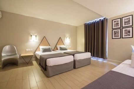 2 habitaciones, caja de seguridad en la habitación y escritorio