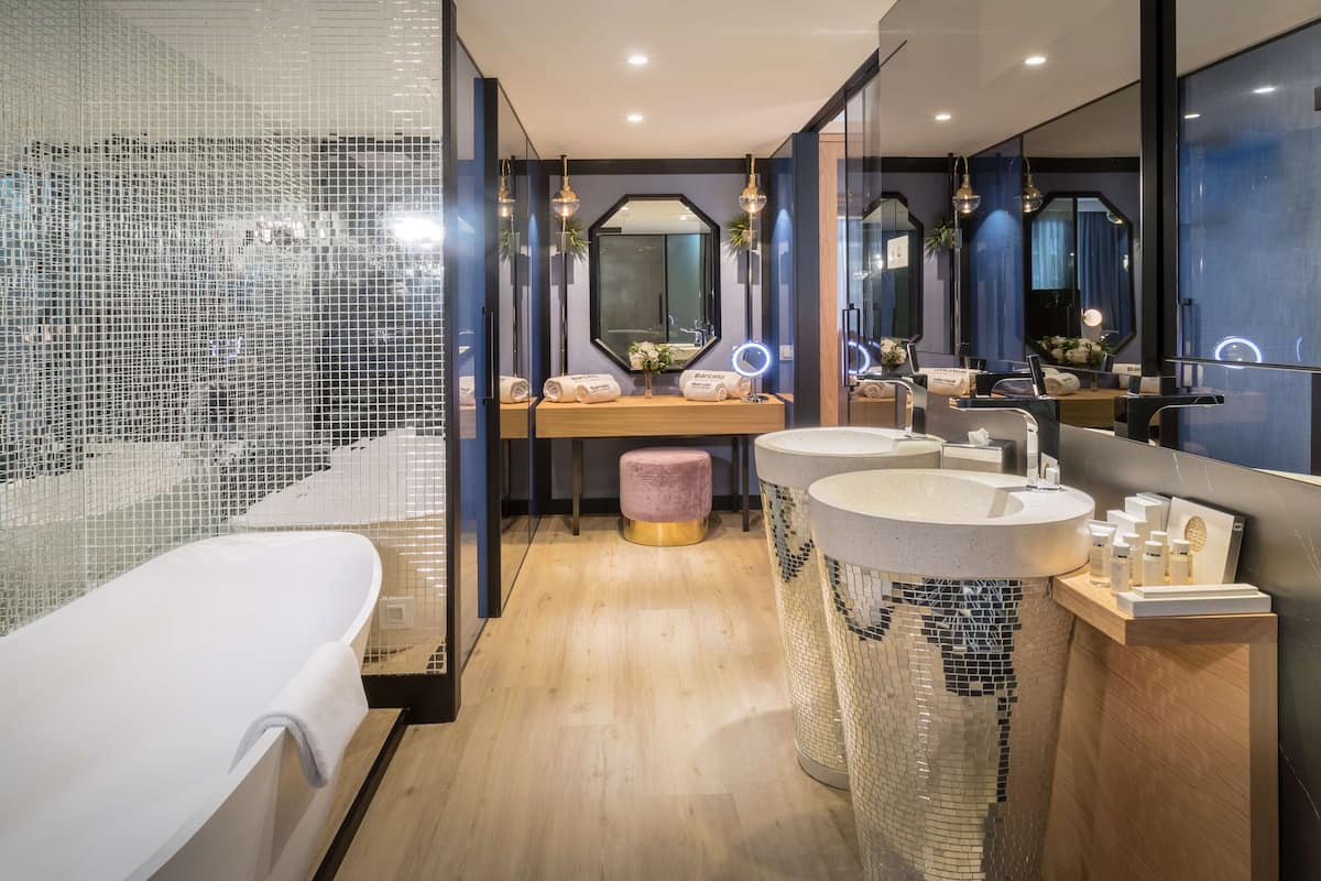 rainfall showerhead, designer toiletries, hair dryer, bathrobes