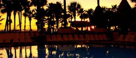 3 outdoor pools, open 8:00 AM to midnight, pool umbrellas, pool loungers