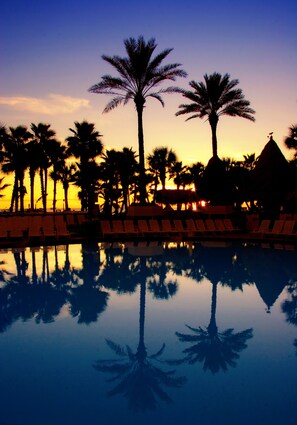 3 outdoor pools, open 8:00 AM to midnight, pool umbrellas, sun loungers