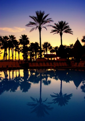 3 outdoor pools, open 8:00 AM to midnight, pool umbrellas, sun loungers