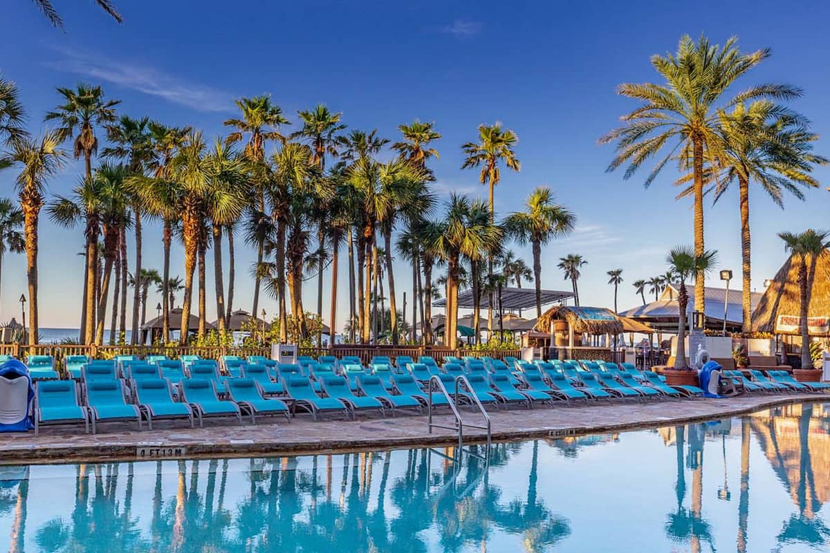 3 outdoor pools, open 8:00 am to midnight, pool umbrellas, pool loungers