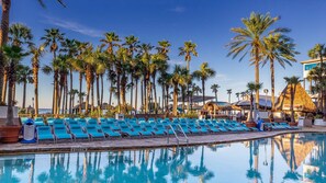 3 outdoor pools, open 8:00 AM to midnight, pool umbrellas, pool loungers