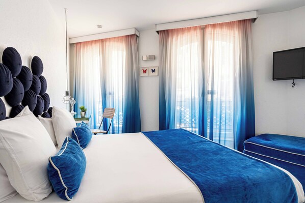 Family Room, 2 Bedrooms, includes soft minibar, courtesy tray, digital press