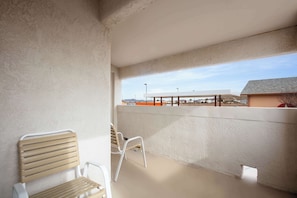 Suite, 1 King Bed, Non Smoking, Balcony (Walk-in Shower;with Sofabed) | 2 bedrooms, in-room safe, individually decorated, desk