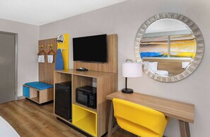 Premium bedding, desk, laptop workspace, iron/ironing board