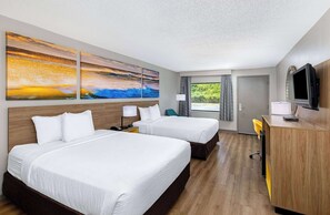 Premium bedding, desk, laptop workspace, iron/ironing board