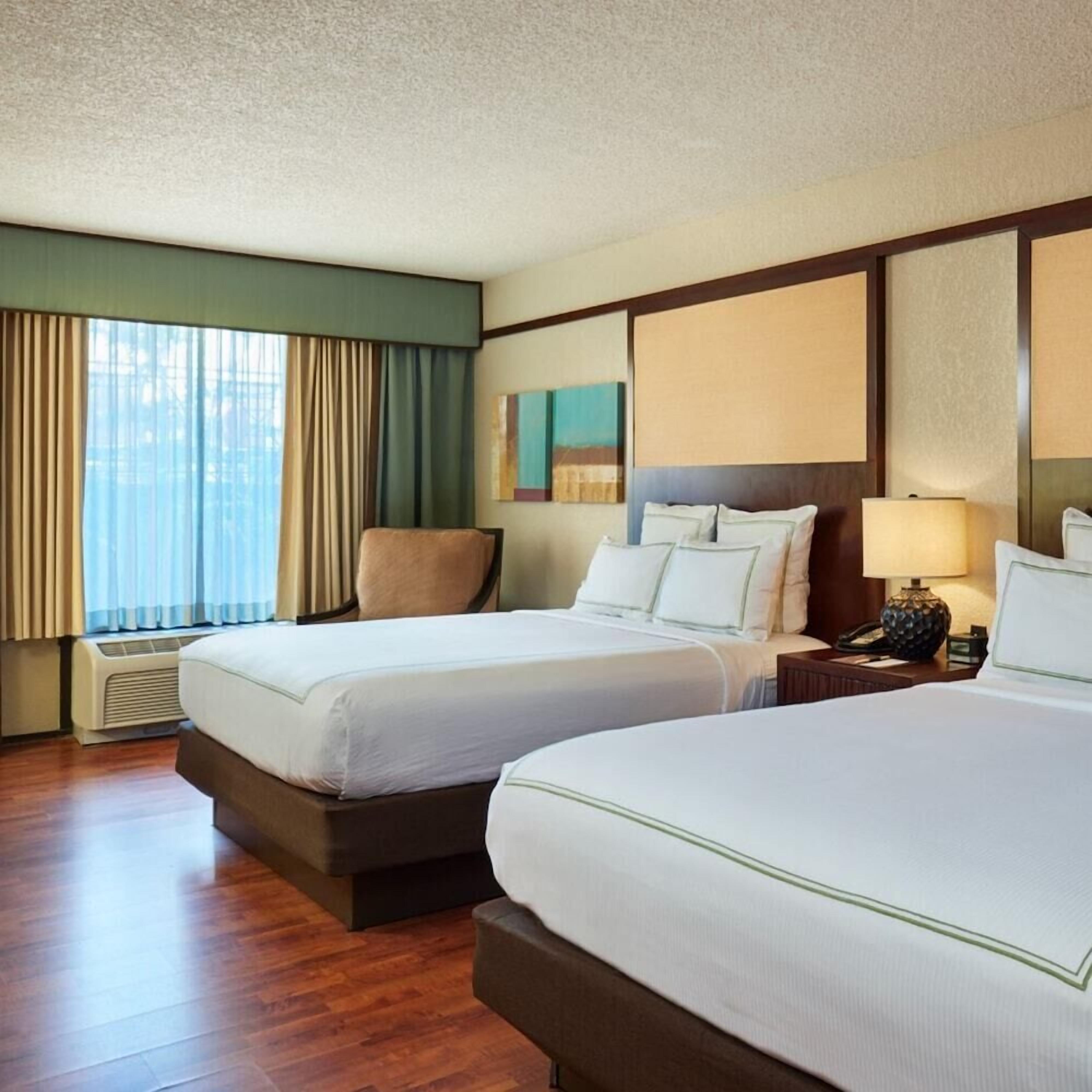 Premium bedding, pillow-top beds, in-room safe, desk