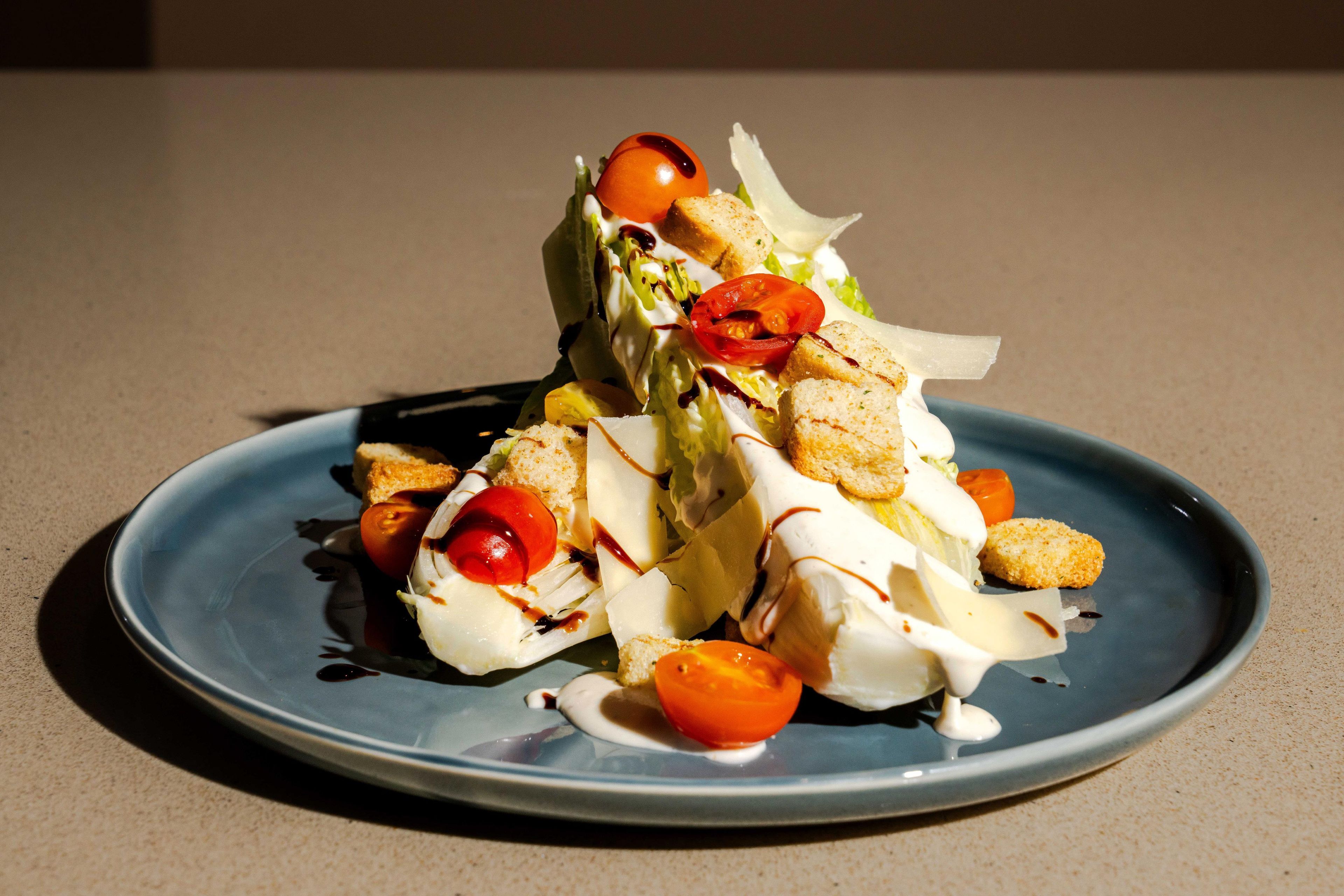 A plate of food with various toppings and sauces.