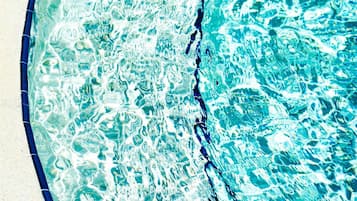 2 outdoor pools, open 6:00 AM to 10:00 PM, pool cabanas (surcharge)