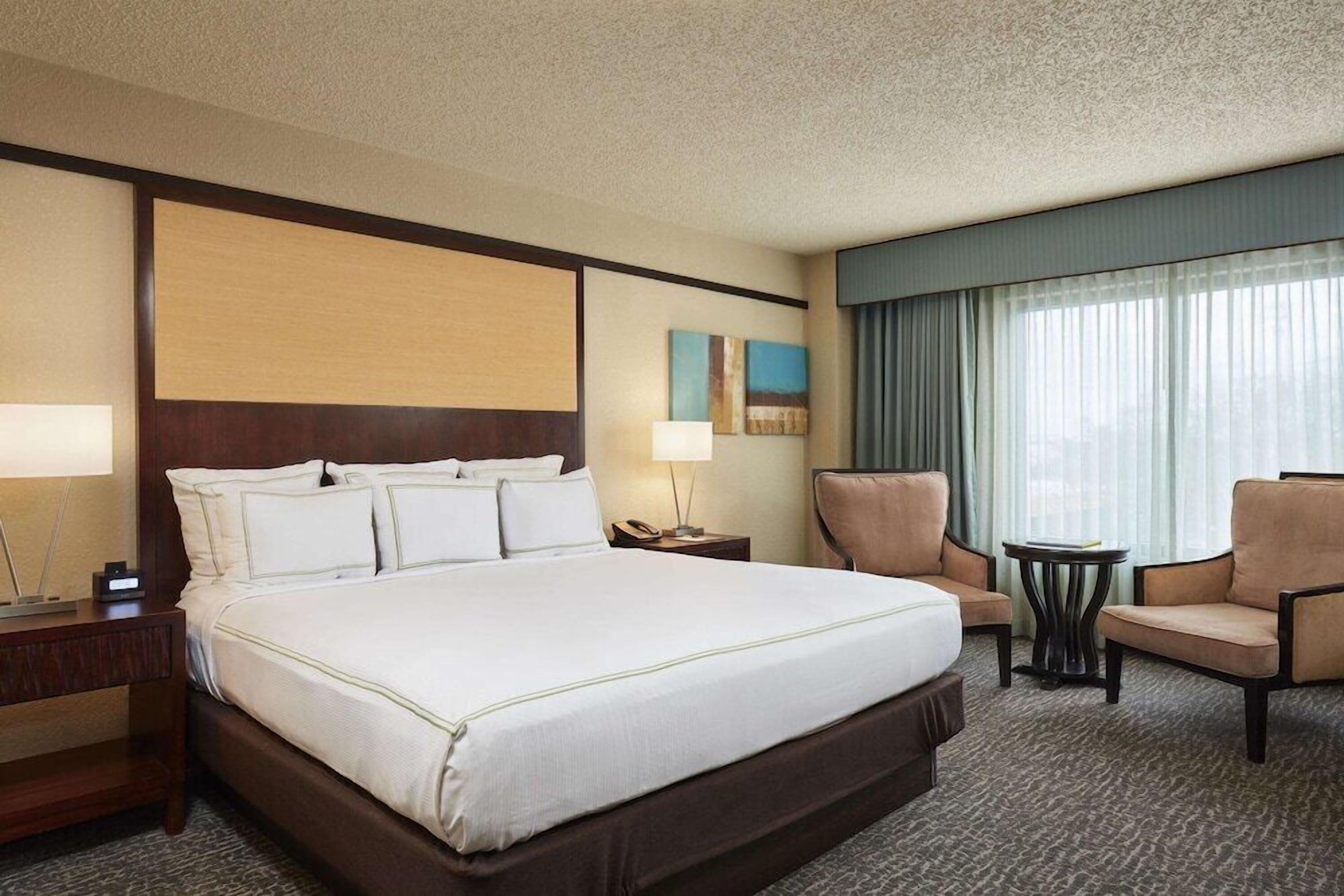 Premium bedding, pillow-top beds, in-room safe, desk