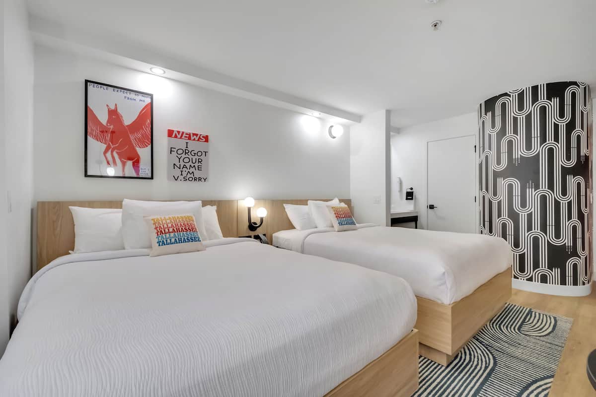 standard room, 2 queen beds | in-room safe, desk, laptop workspace, blackout curtains