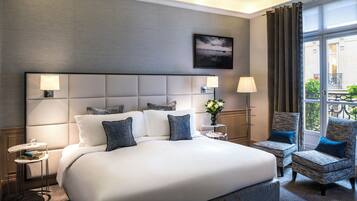 Premium bedding, down comforters, pillowtop beds, minibar