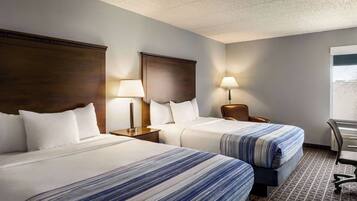 Premium bedding, down duvets, pillow-top beds, desk