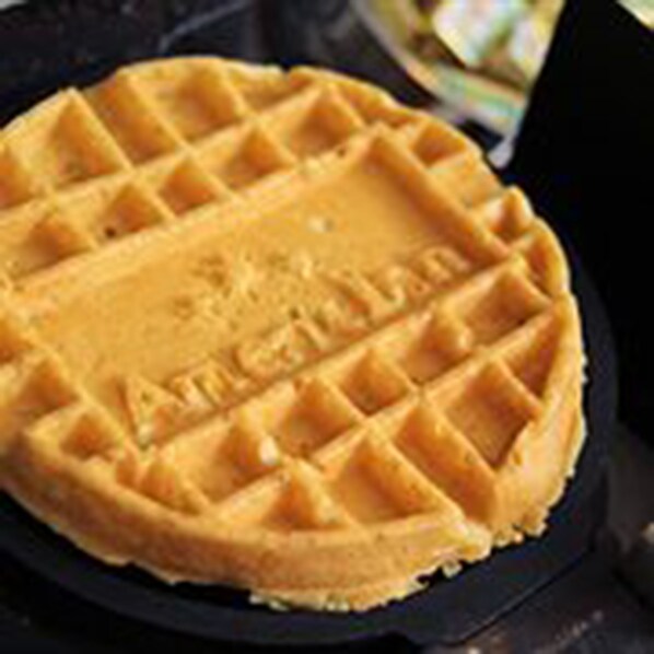 A waffle with a waffle iron imprint. - AmericInn by Wyndham Madison West (Madison)