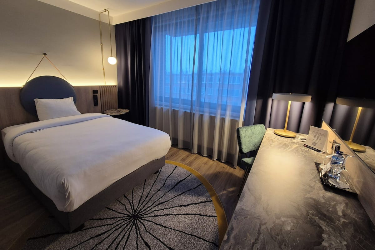 Deluxe Single Room | Premium bedding, in-room safe, desk, blackout curtains