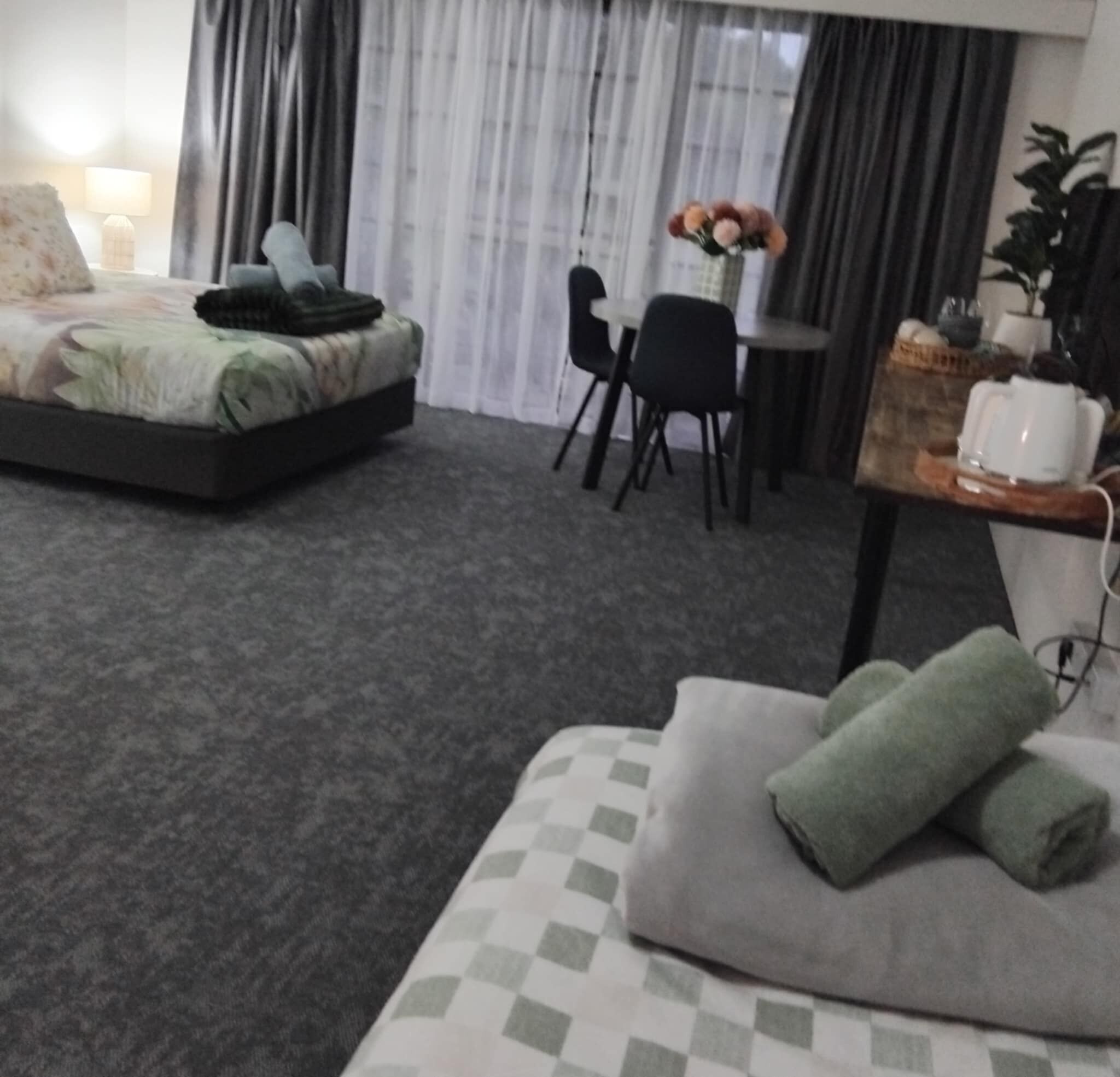 Deluxe Twin Room, Mountain View | Down comforters, desk, blackout drapes, iron/ironing board